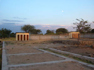Click for full size image of foundation of second half of dorm and back enclosed area