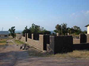 Click for full size image of dormitory second phase walls going up